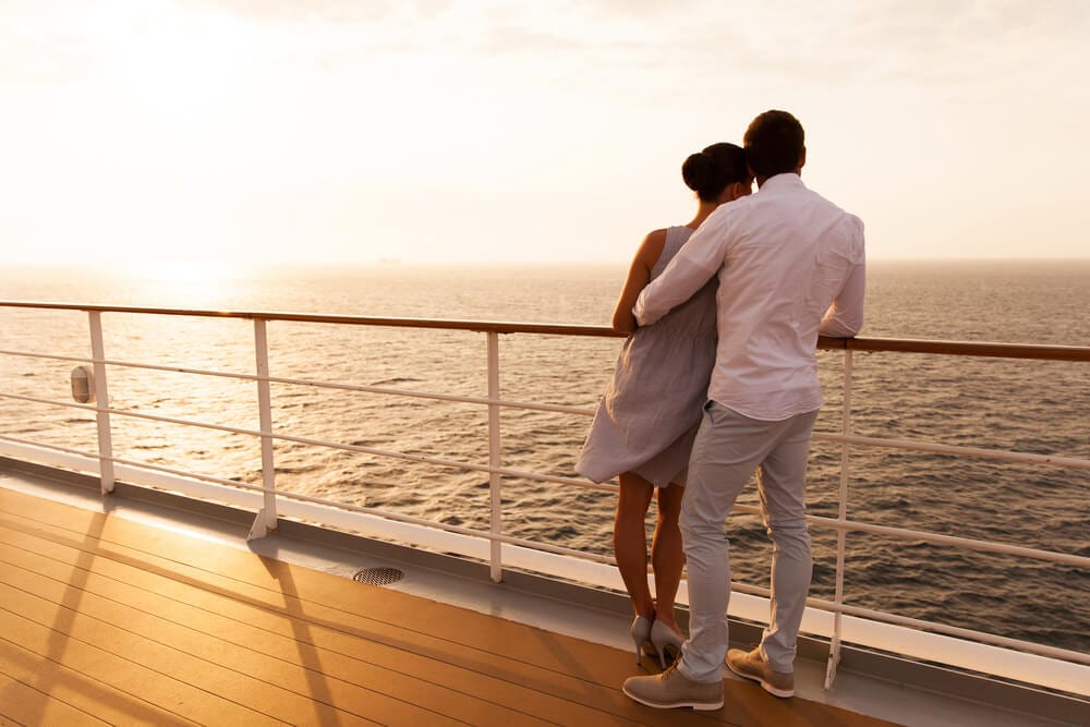 Picture of couple enjoying a Naples sunset cruise.
