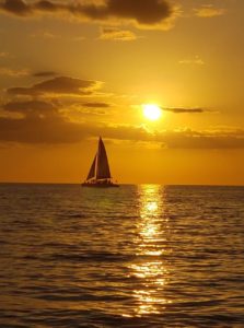 A photo of a sunset in Naples that can be enjoyed at one of the various seafood restaurants. 