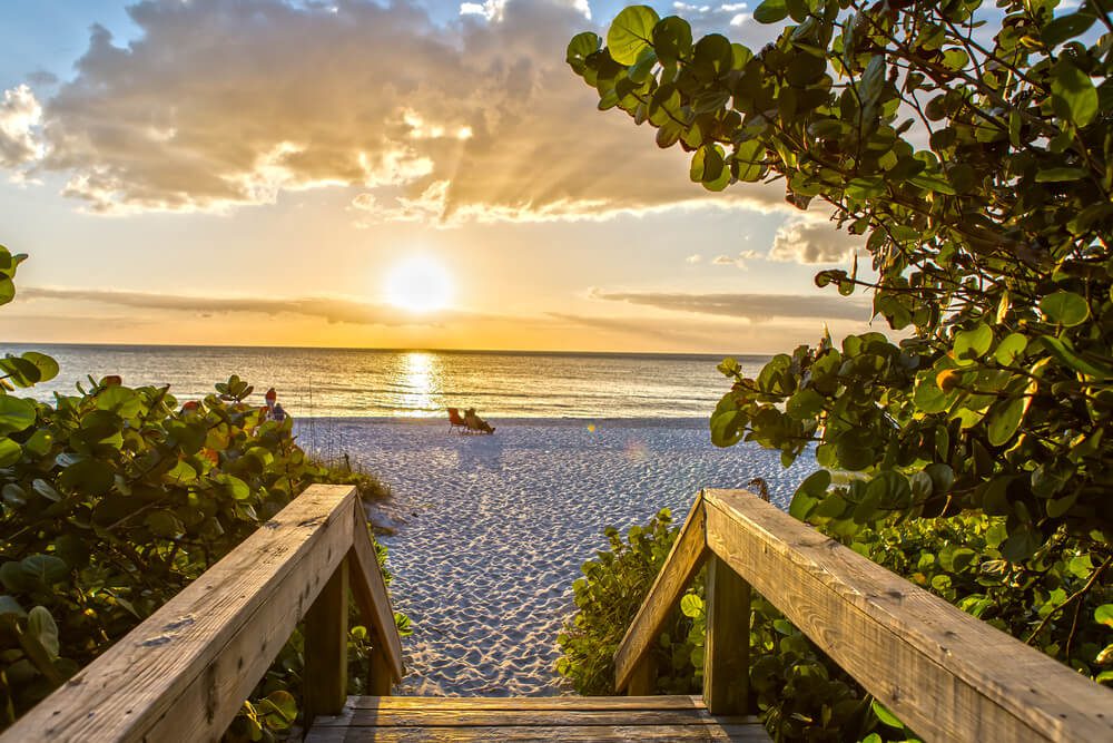 A photo of two people on the beach during a Florida winter vaction.