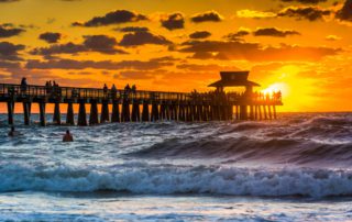 A sunset in Naples near the pier.