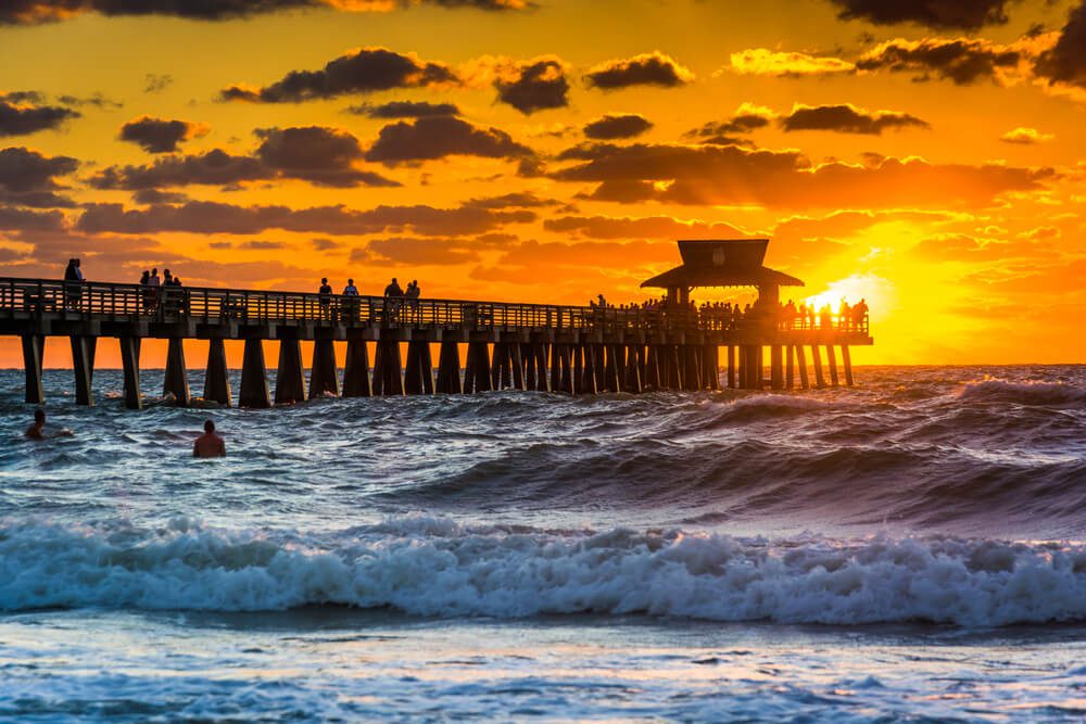 A sunset in Naples near the pier.