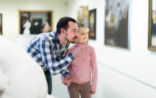 A father and daughter exploring one of the numerous museums in Naples, FL.