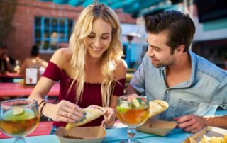 A couple eating at one of the best Mexican restaurants in Naples, FL.