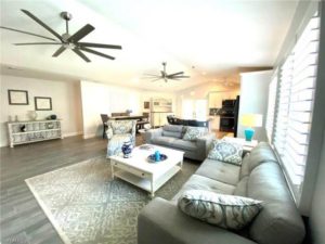 The living room of a Naples, FL, vacation rental near live music venues.