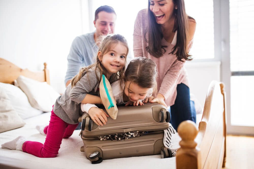 A family packing for their summer vacation in Naples, Florida.