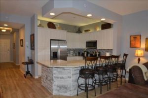 The kitchen of a Naples, FL, vacation rental to cook in using things purchased at local grocery stores.