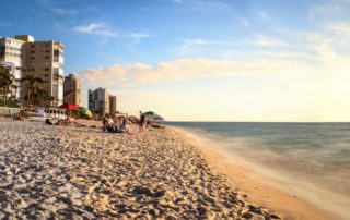 A stretch of shoreline in Vanderbilt Beach, one of the best Naples neighborhoods.