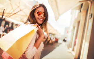 A woman shopping on 5th Avenue South in Naples, Florida.
